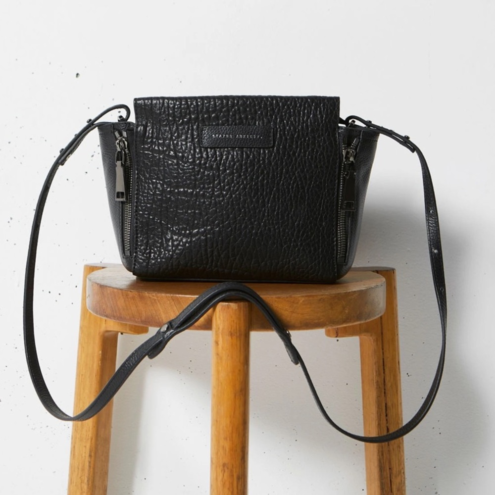 status anxiety “the ascendants” handbag